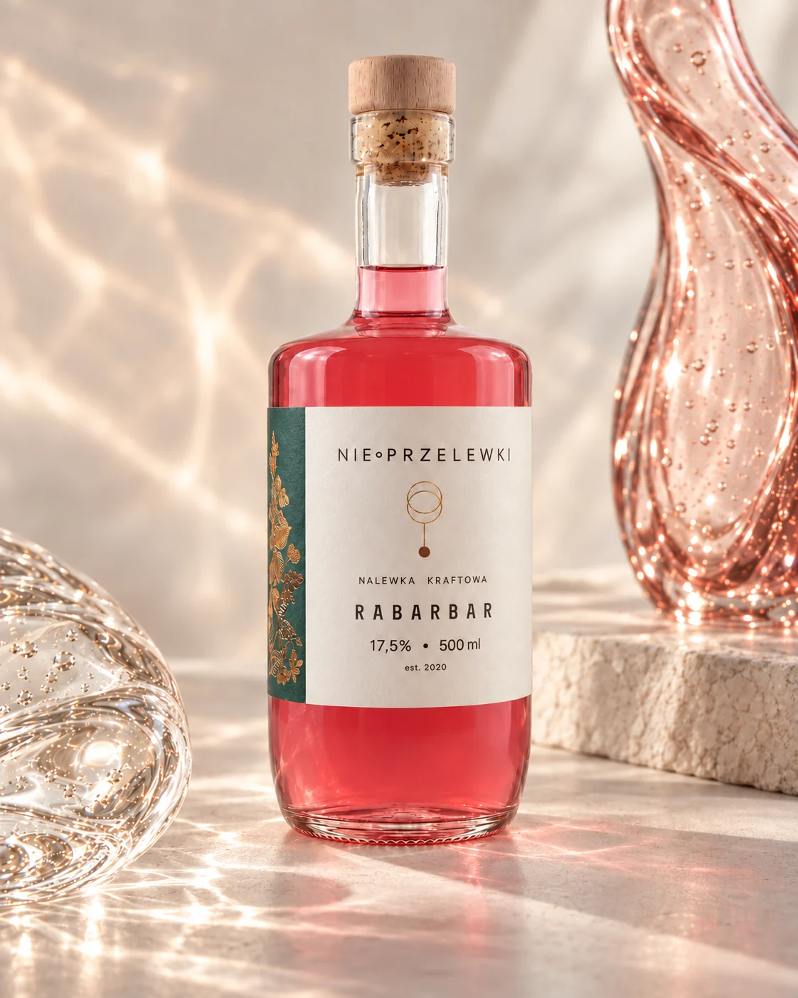 Nie Przelewki Rhubarb nalewka 500 ml bottle among glass forms, light refracted in the glass